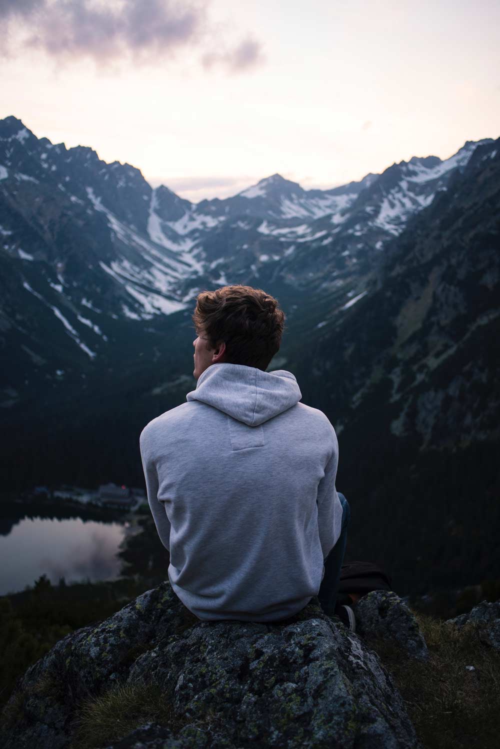 Young adult watching the beauty of the nature - mountains