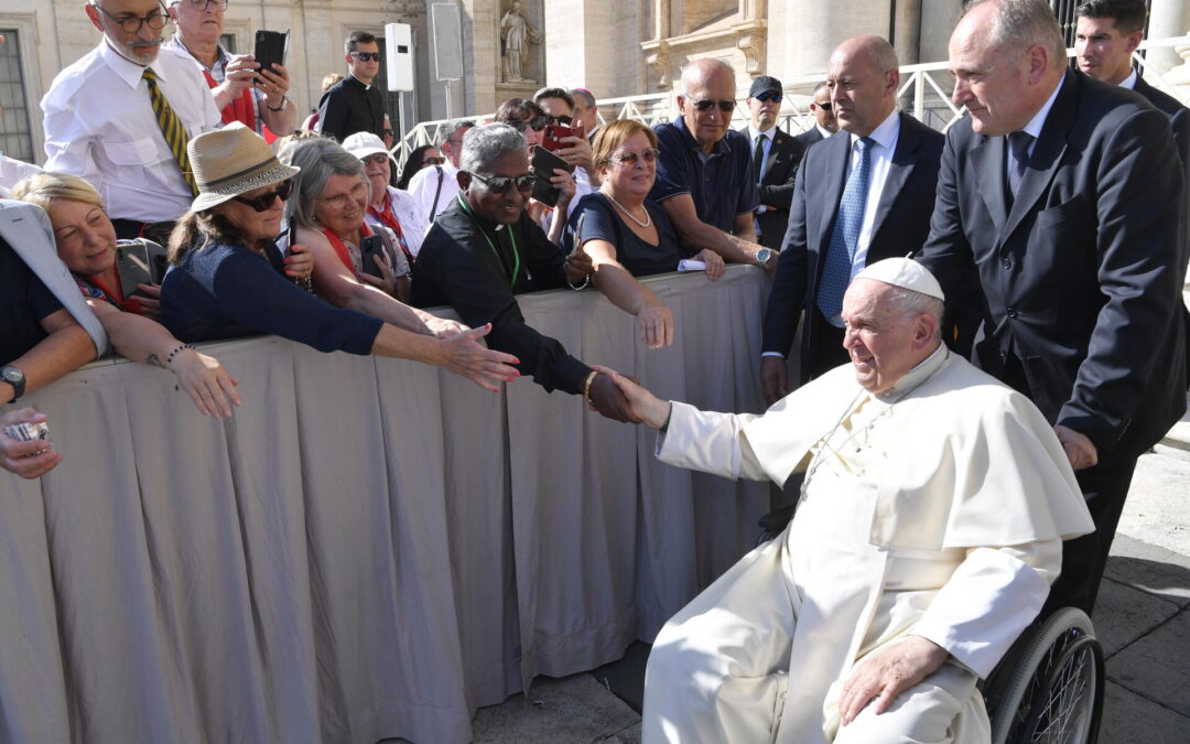 Pope Francis greets Fr. Mani